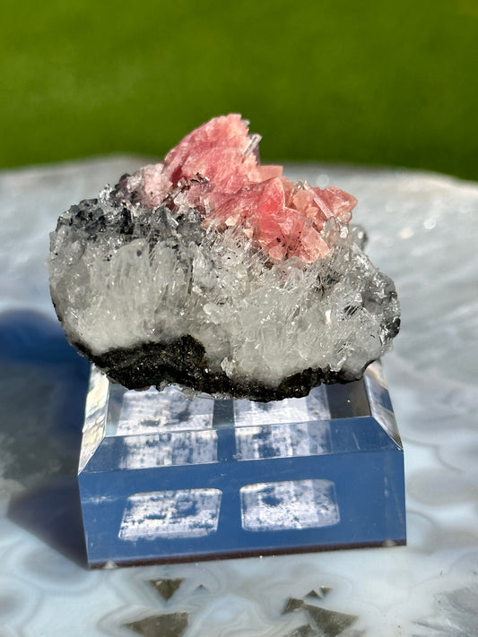 Rhodochrosite on Quartz with Fluorite